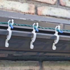 Simple Living Set Of 25 Clear Max Pro Anywhere Christmas Light Clips - 4" 16 Simple Living Set Of 25 Clear Max Pro Anywhere Christmas Light Clips - 4" -Northlight Shop 380293190902432