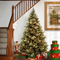 7 Ft. Pre-Lit Carolina Pine Hinged Medium Artificial Christmas Tree, Clear Lights 12 7 Ft. Pre-Lit Carolina Pine Hinged Medium Artificial Christmas Tree, Clear Lights -Northlight Shop D048043S 12