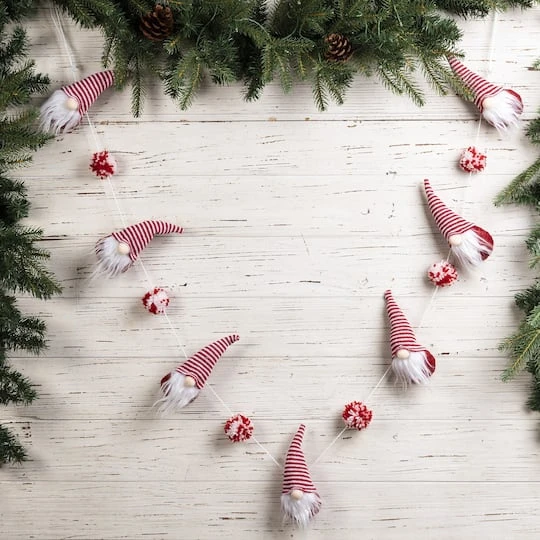 Glitzhome® 6ft. Red & White Fabric Christmas Gnome Garland 5 Glitzhome® 6ft. Red & White Fabric Christmas Gnome Garland - Image 3