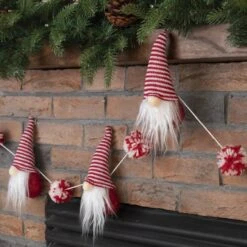 Glitzhome® 6ft. Red & White Fabric Christmas Gnome Garland 13 Glitzhome® 6ft. Red & White Fabric Christmas Gnome Garland -Northlight Shop D253596S 3