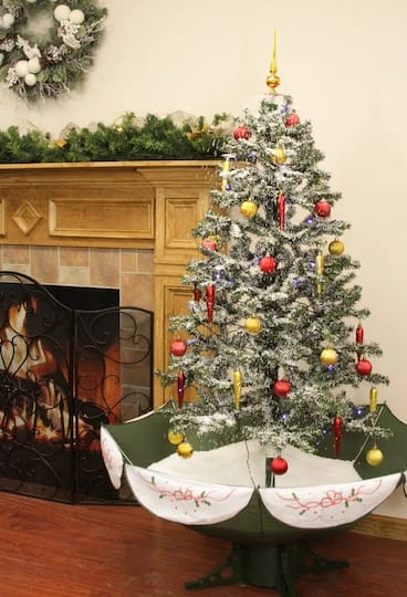 Northlight 5.5ft. Pre-Lit Medium Musical Snowing Artificial Christmas Tree With Umbrella Base, Blue LED Lights 5 Northlight 5.5ft. Pre-Lit Medium Musical Snowing Artificial Christmas Tree With Umbrella Base, Blue LED Lights - Image 3