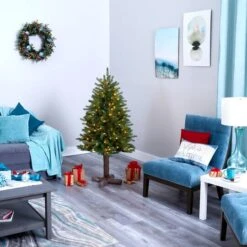 5ft. Pre-Lit Napa Valley Pine Artificial Christmas Tree With Warm White LED Lights On A Faux Wood Stand 16 5ft. Pre-Lit Napa Valley Pine Artificial Christmas Tree With Warm White LED Lights On A Faux Wood Stand -Northlight Shop D255907S 6