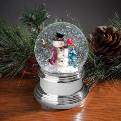 Haute Decor Snowburst™ Animated Snowman Christmas Snow Globe 7 Haute Decor Snowburst™ Animated Snowman Christmas Snow Globe -Northlight Shop D349454S 2