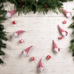 Glitzhome® 6ft. Red & White Fabric Christmas Gnome Garland, 2ct. -Northlight Shop D445245S 2