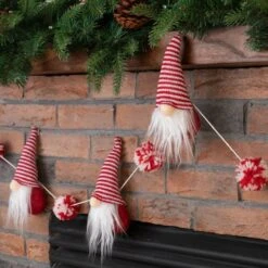Glitzhome® 6ft. Red & White Fabric Christmas Gnome Garland, 2ct. -Northlight Shop D445245S 4