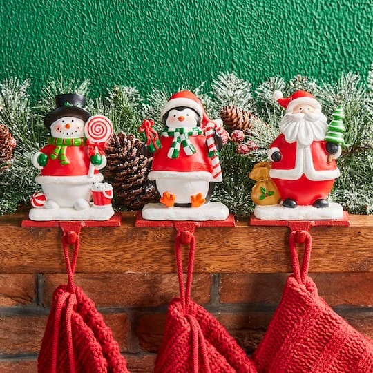 Glitzhome® 7" Santa, Snowman & Penguin Stocking Holder Set 5 Glitzhome® 7" Santa, Snowman & Penguin Stocking Holder Set - Image 3