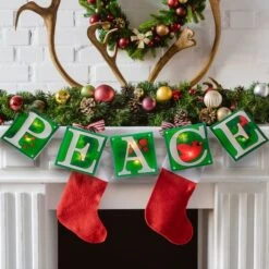 Impact 4.5ft. Shimmering Green Lighted Peace Garland -Northlight Shop D491001S 13