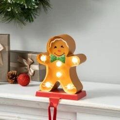Glitzhome® 7.25'' Marquee LED Gingerbread Man Christmas Stocking Holder 13 Glitzhome® 7.25'' Marquee LED Gingerbread Man Christmas Stocking Holder -Northlight Shop D652343S 2