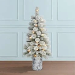 3.5ft. Pre-Lit Potted Flocked Pine Artificial Christmas Tree, White LED Lights -Northlight Shop D659724S 3