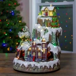 Northlight 17" White LED Lighted & Animated Christmas Village With Moving Train 10 Northlight 17" White LED Lighted & Animated Christmas Village With Moving Train -Northlight Shop D676293S 2