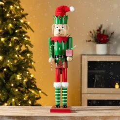 Glitzhome® 23.5"H Wooden Christmas Elf Dog Nutcracker 13 Glitzhome® 23.5"H Wooden Christmas Elf Dog Nutcracker -Northlight Shop D857027S 2